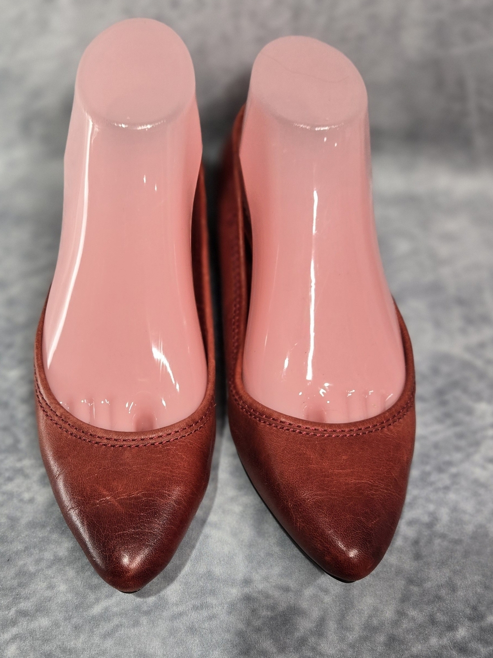 Frye Regina leather ballet flats in a deep red burnished finish with a pointed
